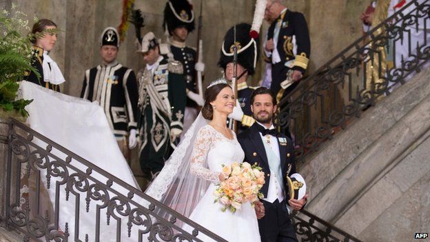 Prince Carl Philip of Sweden is seen with his new wife Princess Sofia of Sweden after their marriage ceremony (13 June 2015)