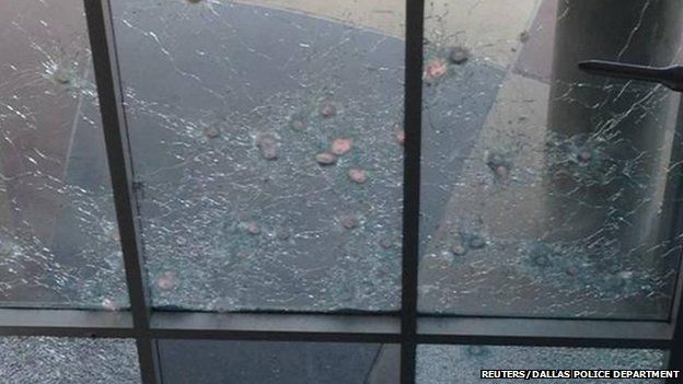 Dallas Police Department headquarters is riddled with bullet holes in Dallas, Texas