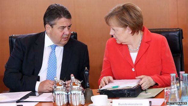 Sigmar Gabriel, German vice-chancellor, with chancellor Angela Merkel