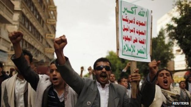 Houthi supporters demonstrate against Yemen President Abdrabbuh Mansour Hadi. Sign reads: "Allah is the greatest. Death to America. Death to Israel. A curse on the Jews. Victory to Islam"