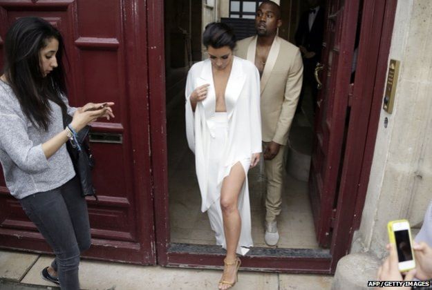 Kanye West and Kim Kardashian have flown to Italy ahead of their wedding.