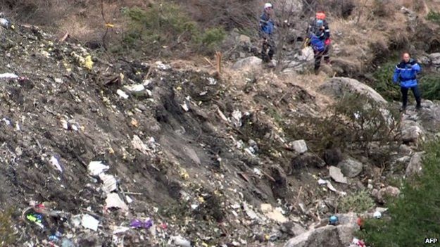 Recovery workers at crash site