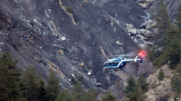 Rescue helicopter at crash site