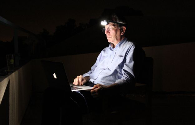 Mark Doyle working late at night in Mali