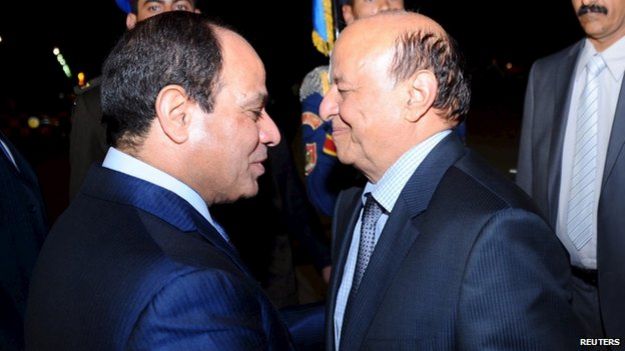 Egypt's President, Abdel Fattah al-Sisi (L) greets Yemen's President Abdrabbuh-Rabbi Mansour Hadi upon his arrival at Sharm al-Sheikh 27 March 2015