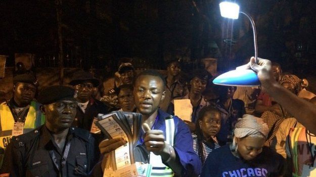 Counting votes by torchlight in Abuja