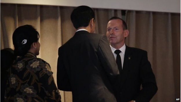 Australian PM Tony Abbott and Indonesian President Joko Widodo at the funeral