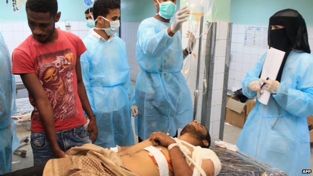 A Yemeni man receives treatment at a hospital in the southern city of Aden on April 2, 2015