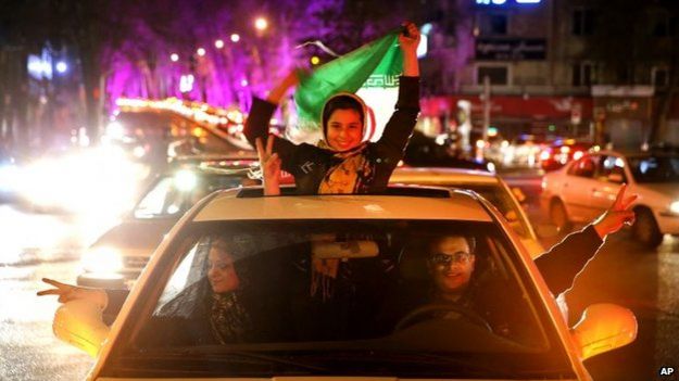 Iranians celebrate on a street in Tehran, Iran, (2 April 2015)