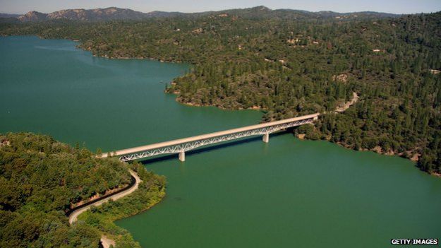 The Enterprise Bridge passes over full water levels at a section of Lake Oroville near the Bidwell Marina on July 20, 2011 in Oroville, California.