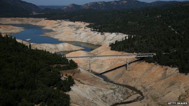 The Enterprise Bridge passes over a section of Lake Oroville that is nearly dry on August 19, 2014 in Oroville, California