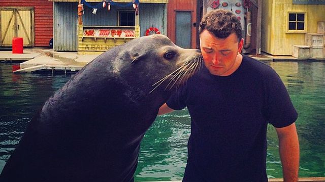 Sam Smith with a seal
