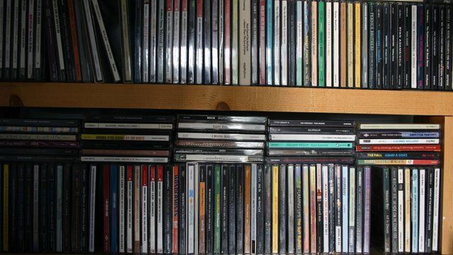 CDs on a shelf