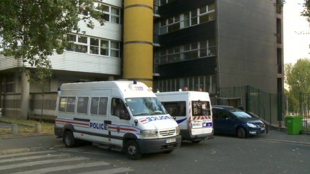 Police van at Charlie Hebdo building