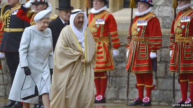 The Amir Sheikh Sabah Al-Ahmad Al-Jaber Al-Sabah of Kuwait chats with Queen Elizabeth II as he arrives at Windsor Castle
