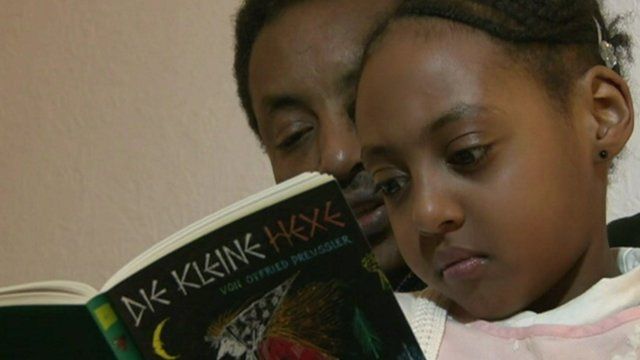 Father and child reading