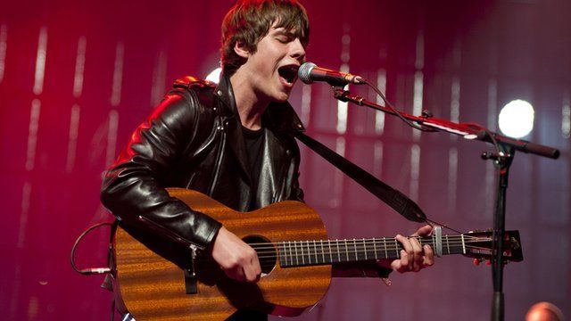 Jake Bugg performs on stage at the Roundhouse, London, during the iTunes Festival 2013