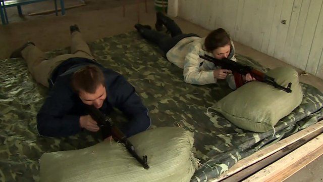 Ukrainian civilians training to use firearms