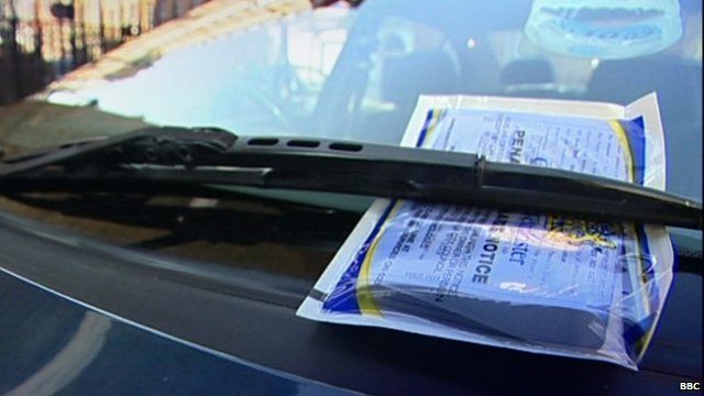 parking ticket on car window