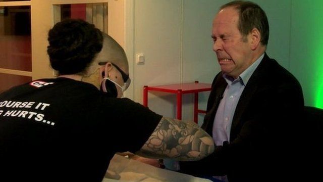 Rory Cellan-Jones being chipped