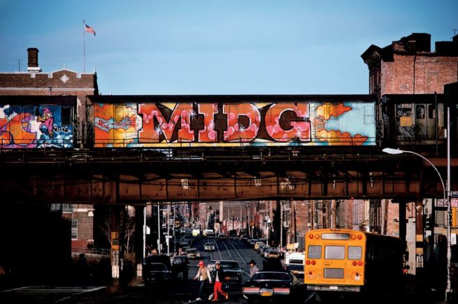 "Midg" with yellow school bus, 1982