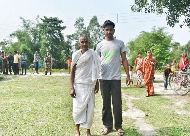 Sudama Shil, 30, brought his 90-year-old grandmother Bashanti Shil to the polling booth.