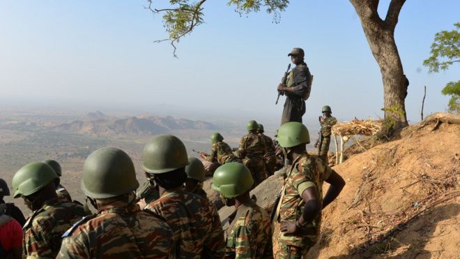 Cameroon's army forces patrol on Febuary 16, 2015 near the village of Mabass, northern Cameroon.