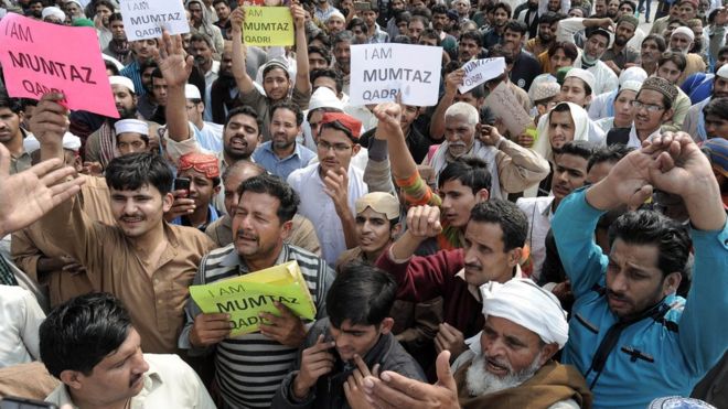 Pakistani demonstrators shout slogans during a protest against the execution of convicted murderer Mumtaz Qadri in Lahore on February 29, 2016