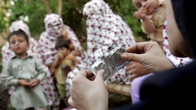 Condoms are shown to a group of women during a safe sex education class in Sawabi in the conservative Muslim Pashtun belt of western Pakistan (file photo)