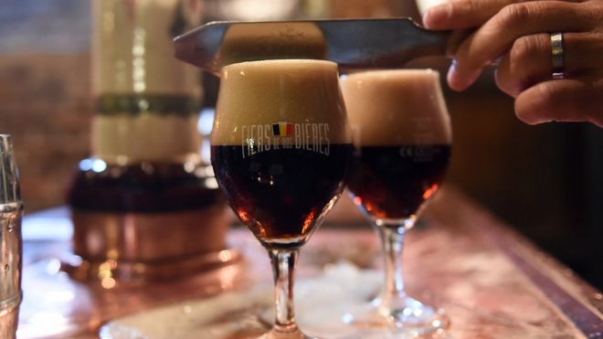 A beer is served at the Belgium guild of brewers on Grand Place in Brussels, on October 23, 2015.