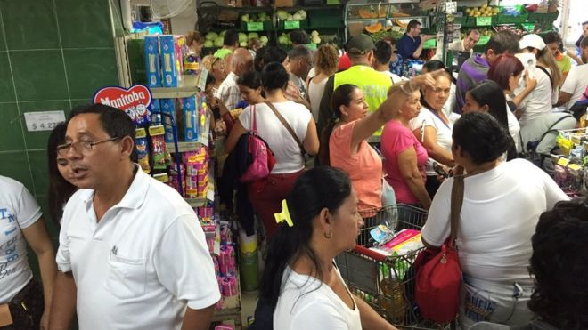 Venezuelans shop at supermarket in Cucuta, Colombia