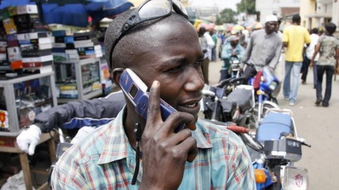 A man on a mobile phone in Nigeria