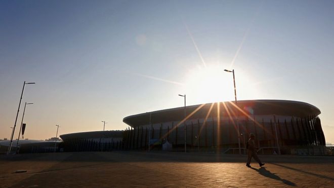 A worker walks past Arena Carioca One on July 14, 2016 in the Barra da Tijuca district of Rio de Janeiro, Brazil.