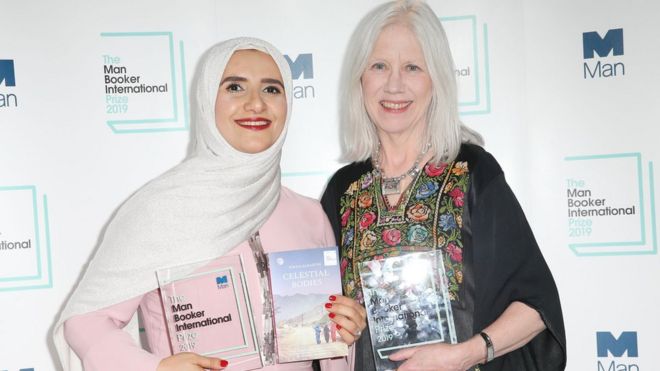 Arabic author Jokha Alharthi (L) and translator Marilyn Booth after winning the Man Booker International Prize for Celestial Bodies in London on May 21, 2019