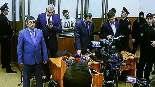A photograph of a monitor showing a live broadcast from Donetsk City Court room during a sentence hearing of former Ukrainian military pilot Nadiya Savchenko in Donetsk, Rostov Region, Russia, 22 March 2016