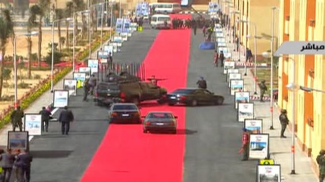 Egyptian presidential motorcade drives down red carpet in 6 October City on 6 February 2016
