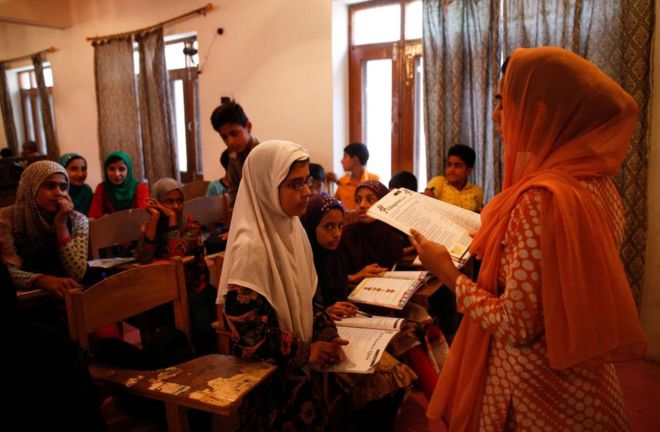 Kashmiris attending alternate classes in Srinagar.