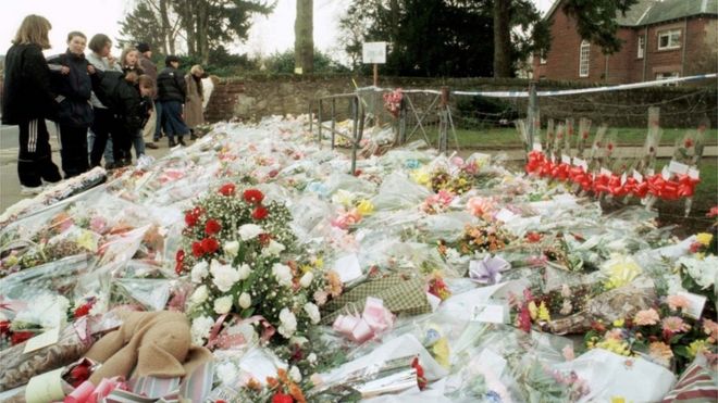 Flowers outside Dunblane Primary School a day after the shooting in 1996