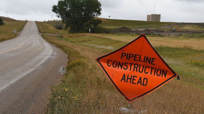 A sign warns of oil pipeline construction ahead, in Johnsons Corner, North Dakota, September 6, 2016