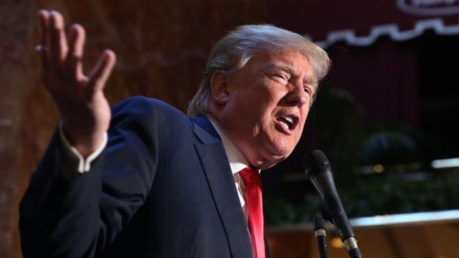 Donald Trump gestures during a speech