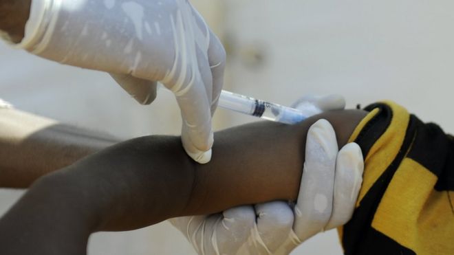 A child getting vaccinated in East Africa