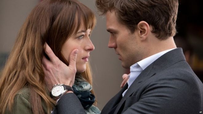 Dakota Johnson and Jamie Dornan appear in Fifty Shades of Grey