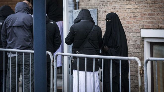 Visitors arrive at courthouse in Amsterdam ahead of the verdict. 10 December 2015