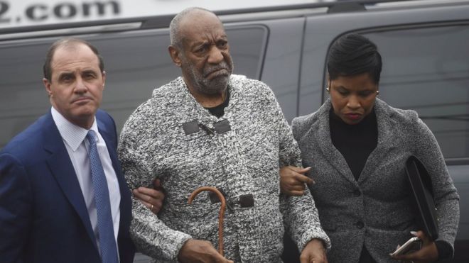 Actor and comedian Bill Cosby (C) arrives with attorney Monique Pressley (R) for his arraignment on sexual assault charges at the Montgomery County Courthouse