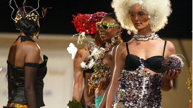 Models present creations by French designer Catherine Bizoux at the International Festival of African Fashion (FIMA), 01 December 2005, in Niamey.