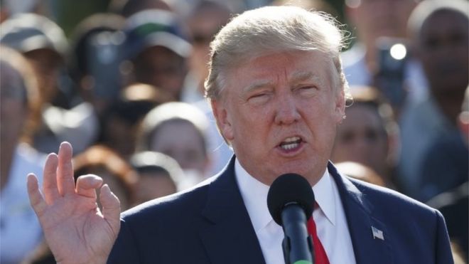 Republican presidential candidate Donald Trump speaks during an campaign event with employees at Trump National Doral in Miami.