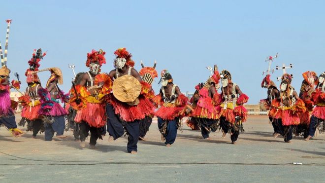 Masks performing their annual dance ritual in Mali's Dogon Land in Mopti