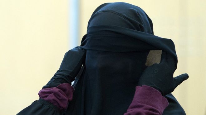 Suspected Islamic State supporter Jennifer Vincenza M stands in the courtroom before the beginning of her trial in Duesseldorf, Germany, 21 January 2015