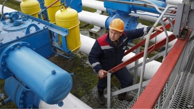 A worker checks equipment at the Dashava gas storage near the western Ukrainian town Stryi