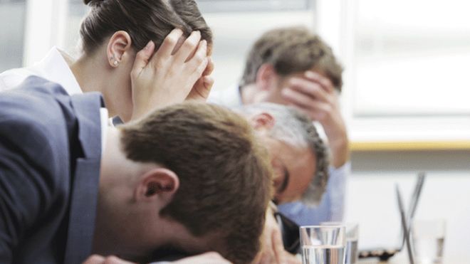 People asleep at a meeting